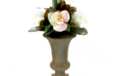 Magnolias and roses in rust urn